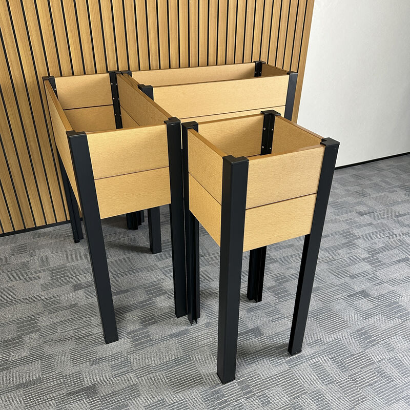 سرير حديقة مرتفع مع أرجل معدنية لزراعة الخضروات والزهور والأعشاب في الهواء الطلق