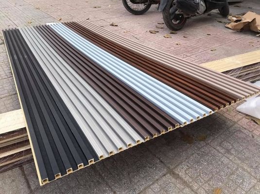لوح الحائط الخشبي PVC WPC لوح الحائط المخدد WPC 3D Wall Panel